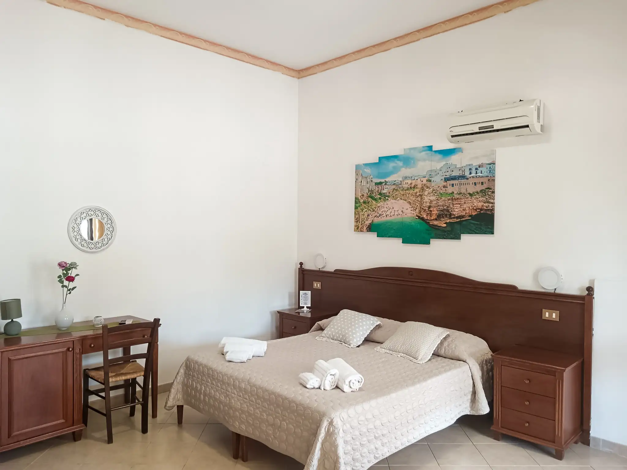 Camera Quadrupla Scopello Background